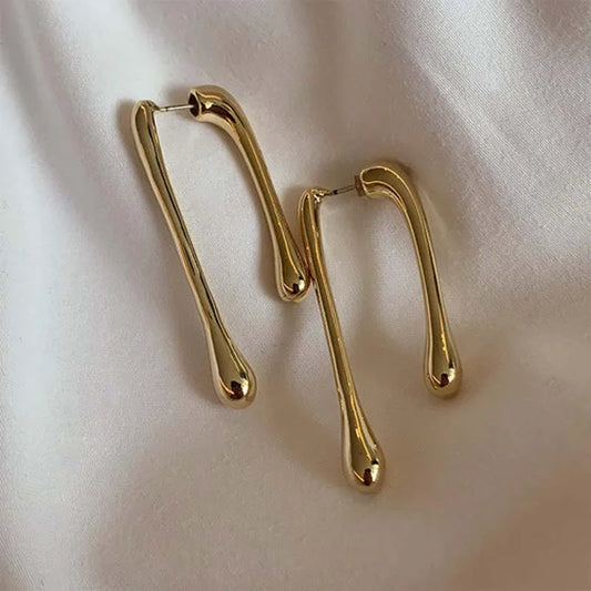 Aretes Drop Dorados para Mujer – Moda Minimalista, Accesorio Sofisticado