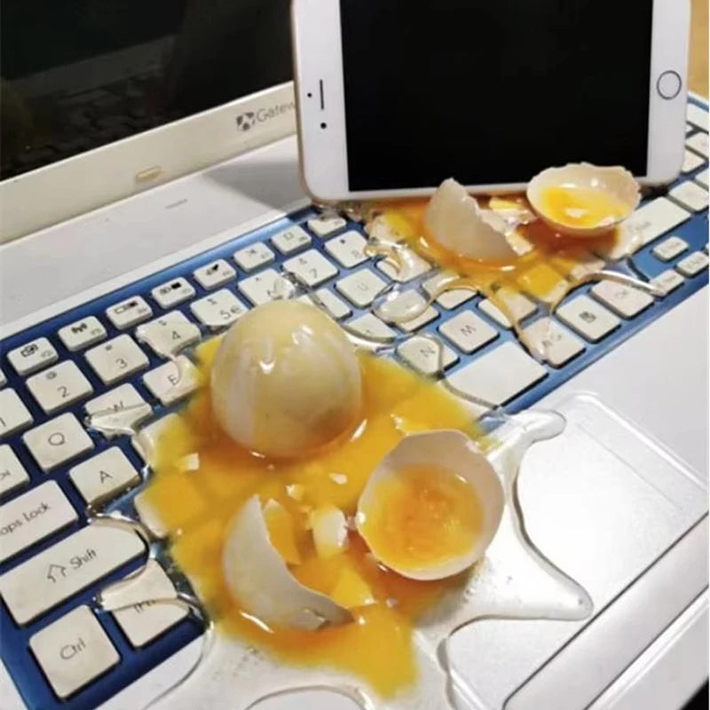 Soporte de Celular Huevo Estrellado Hiperrealista - Broma para Escritorio