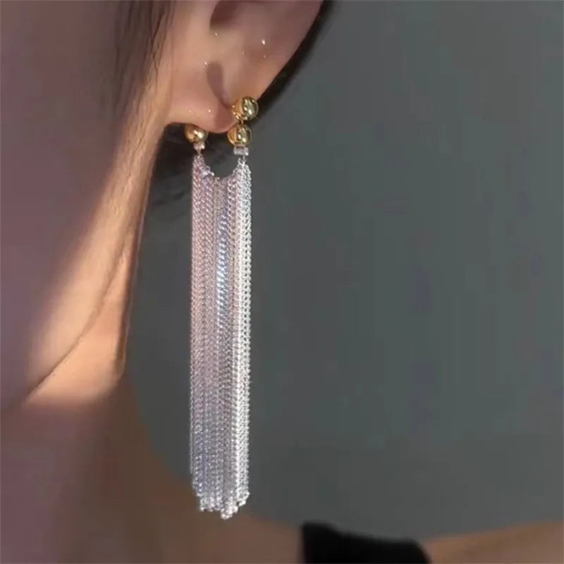 Aretes Copo de Nieve con Cristales – Estilo Largo y Sofisticado, Diseño Femenino