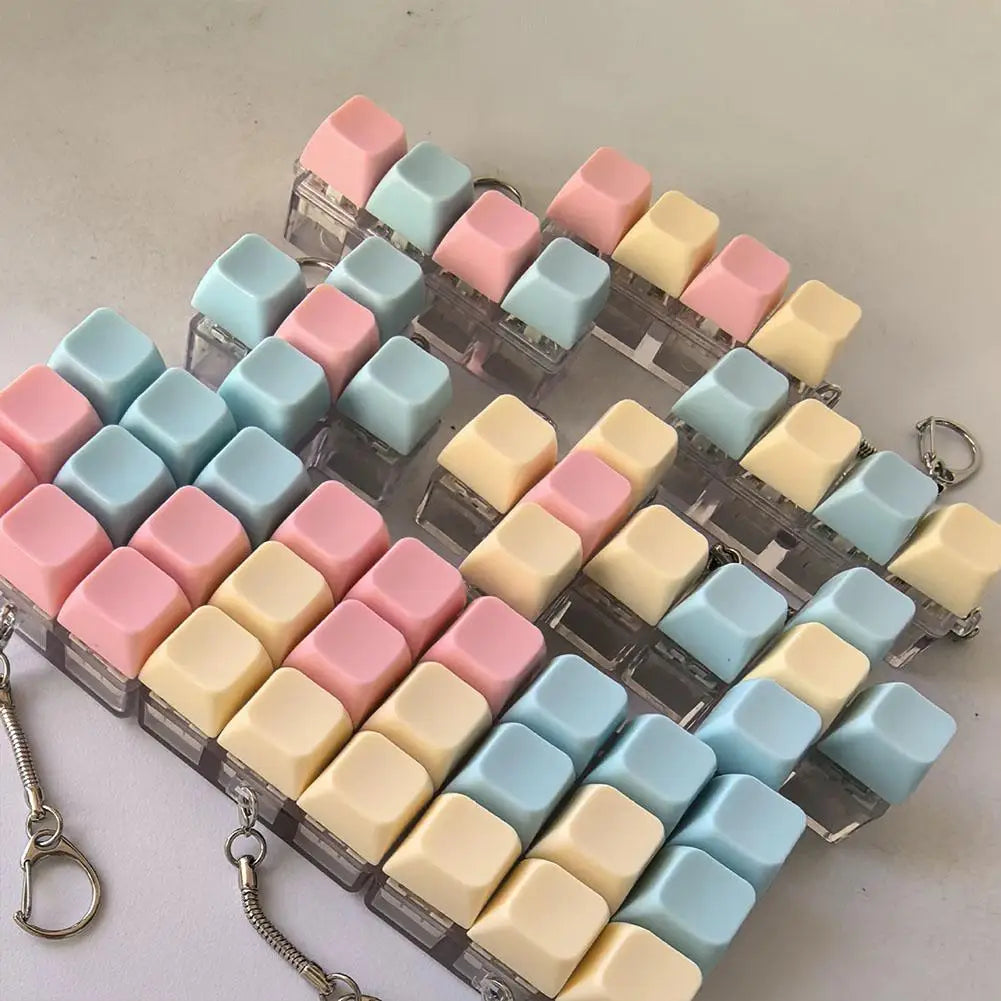 Mini Teclado Antiestrés con Llavero (Fidget Clicker)