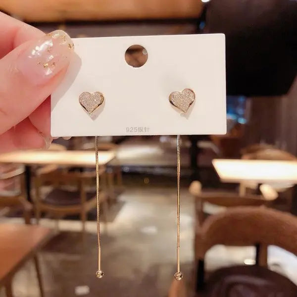 Aretes Copo de Nieve con Cristales – Estilo Largo y Sofisticado, Diseño Femenino
